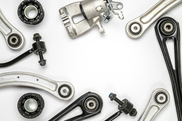 Car inspection. Auto motor mechanic spare or automotive piece on white background. Set of new metal car part. Repair and vehicle service with space for text.