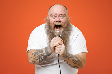 Fat fun happy pudge obese chubby overweight tattooed blue-eyed bearded big belly man 30s in white...