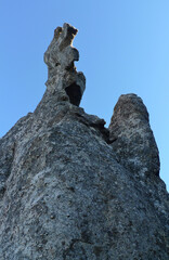 A rugged rock looking like a huge monster