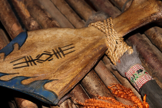 Tomahawk made of bone with decorated handle