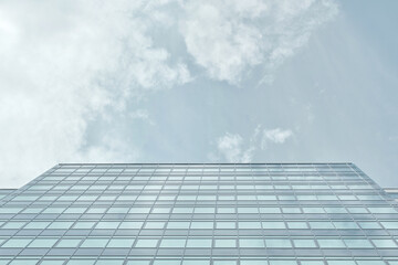 Fototapeta na wymiar Modern glass building against the sky