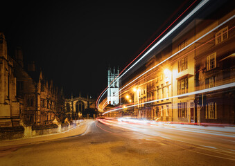 Naklejka na ściany i meble Traffic Light Trails Past Oxford University Buildings Along High Street