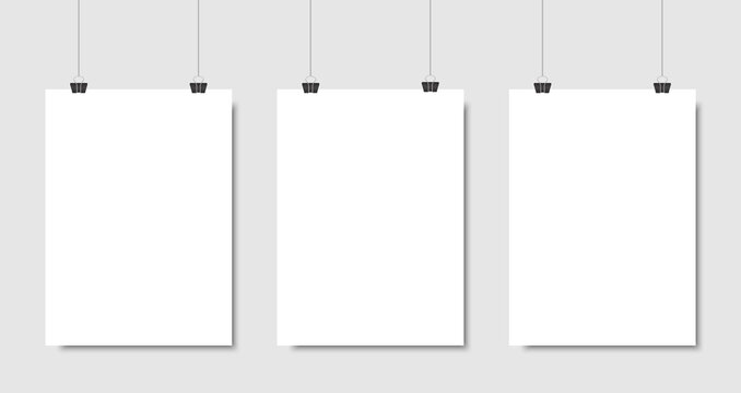 Set of three white realistic blank paper pages with shadow. Three empty paper sheets or blank pictures canvas hanging on wall. Design poster, template or mockup on gray background. Vector illustration