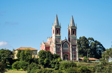 Fototapeta na wymiar church of Saint Peter Ad vincula, neogothic monument from 1894 in Cobreces, Alfoz Lloredo, Cantabria, Spain, Europe
