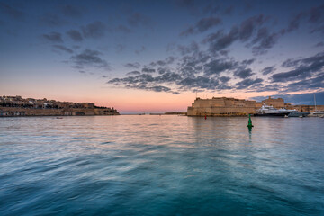 Beautiful coastline of Valletta city at sunset, Malta.
