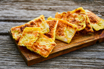  Fish and chips .Close up of   crispy breaded  deep fried fish fingers with breadcrumbs served with remoulade sauce and  lemon