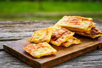 Fresh baked home made  cheese puff pastries.Cheese pie with phyllo pastry and  white cheese.