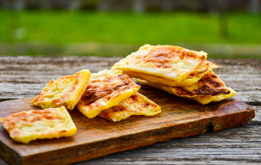 Fresh baked home made  cheese puff pastries.Cheese pie with phyllo pastry and  white cheese.