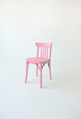Pink old wooden chair isolated on a white background. Space for text.
Vacant chair. The concept of selection and casting. 
