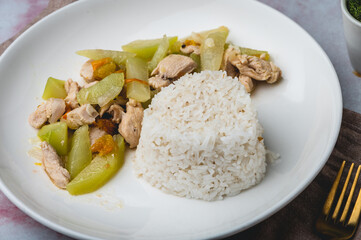 Ginisang Sayote- Sauteed Chayote with Chicken and Rice- a simple but healthy Filipino meal set. (profile close up)