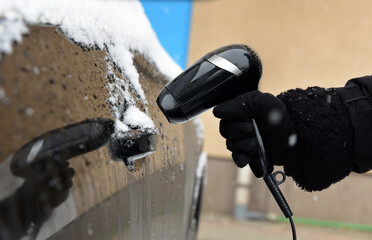 Defrosting a car lock with a hair dryer
