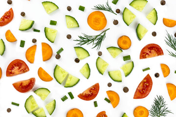 The vegetables cut by slices are isolated on a white background.