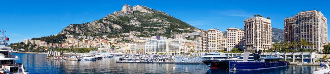 Fototapeta na wymiar panorama view of the harbor of Cape d'Ail and hotels in the Fontvielle District of Monaco