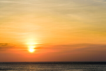 Fototapeta na wymiar Colorful beautiful sunset with the orange cloud background