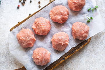 meatballs raw minced meat chicken or turkey healthy meal top view copy space for text food background rustic image keto or paleo diet
