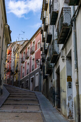 road leading up into the old city center of Cuenca along many colorful houses