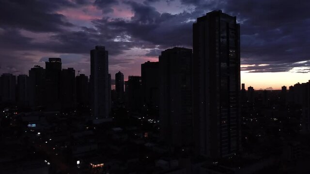 Sunset in big city Goiania, in Brazil. Skyline in dusk with skyscrapers