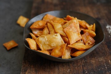Sweet Diamond cuts - Deep fried Kerala sweet snack with flour coated in sugar syrupr