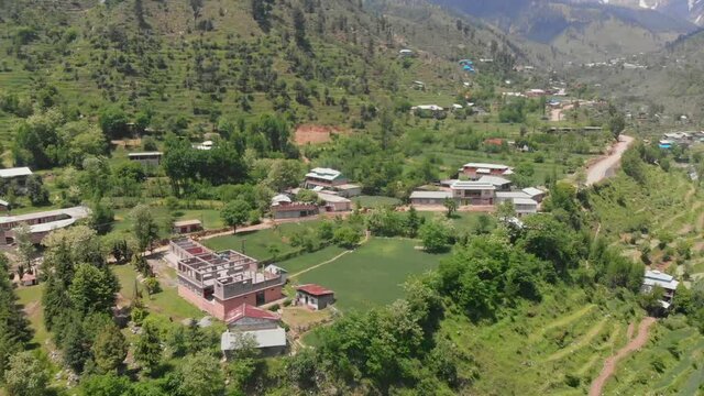 Aerial Over Swat Valley Village At Gabin Jabba In Pakistan. Dolly Forward