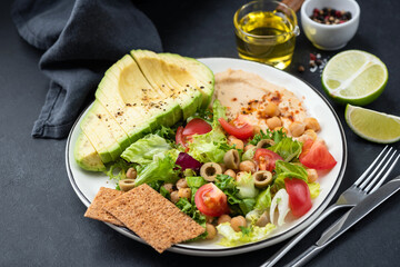 Vegan superfood salad with avocado and chickpeas