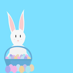 white rabbit next to basket with easter eggs on light blue background