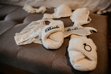 Fototapeta premium wedding details white bride essentials garter heels slippers