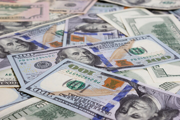 Bundle of dollars on the table close-up - texture, background