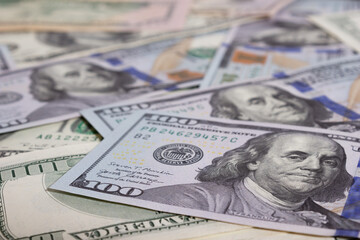 Bundle of dollars on the table close-up - texture, background