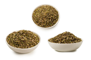 Oregano in a bowl isolated.