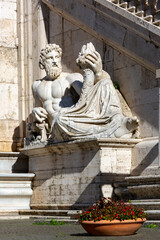 Statue of Tiber River God (Tiberinus) on Capitoline Hill on Piazza del Campidoglio, Rome, Italy