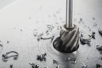 Milling сutter make sink in hole in steel billet. Locksmith work.