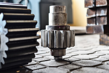 Gear shaft after manufacturing on a CNC milling machine with tooth cutting on a gear cutting machine.