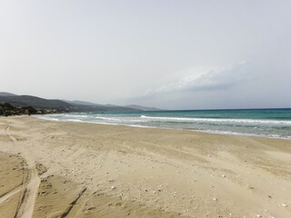 sandy beach and clouds on  sky background 