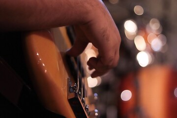 playing the guitar close up