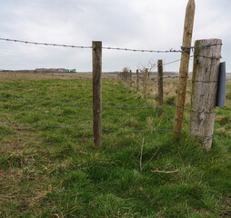 the corner of a barbed wire cattle fence on Salisbury Plain Wiltshire
