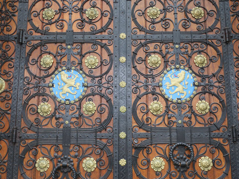 entrance door of the Rijksmuseum  in Amsterdam with two golden lions