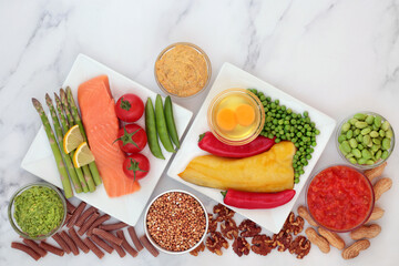 Low glycemic food for diabetics for a healthy diet with vegetables, seafood, grains, dairy,...