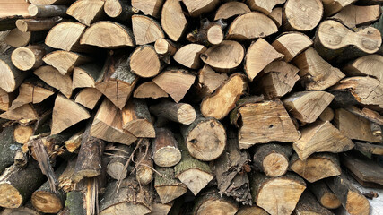 Winter prepared wood near the barn