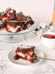 Homemade Brownie pie with cream cheese and cherries..