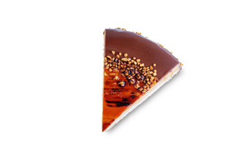Caramel cake decorated with nuts on a white isolated background