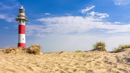 Tuinposter vuurtoren op het strand © Patrick Herzberg