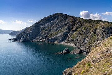 Fototapeta na wymiar coastal landscape of the beautiful mountainous shoreline of the Cape Cerbere region in France