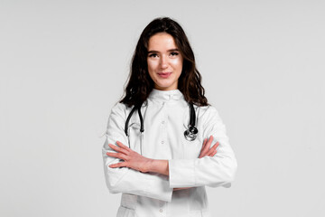 Doctor in medical robe with stethoscope at coronavirus covid-19 period. Nurse in white medical dress on white background