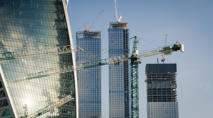 Cranes and towers on the construction site