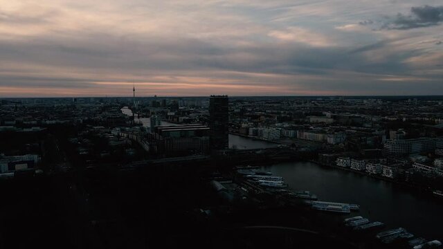 View of the "Allianz Tower" and the city of Berlin at sunset