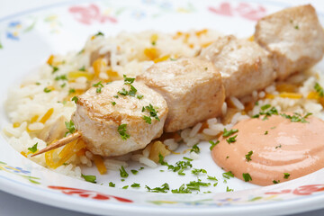 rice with chicken kebab and vegetables