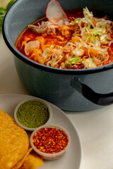 Mexican Pozole with peper, oregano and tostadas