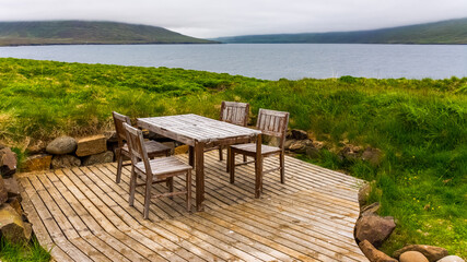 open air table for enjoying a snack in the middle of nature in Skalanes, Iceland during summer season