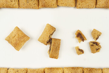 A set of chocolate breakfast pads, on a white background. 