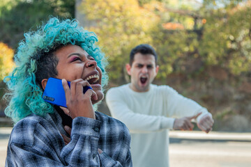 funny woman talking on the phone and man asking the time furious